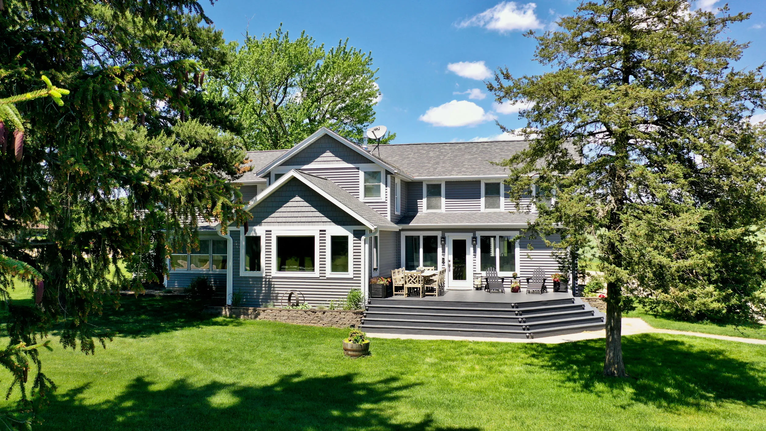 A photograph of the back of a house that we completed an exterior renovation on. 